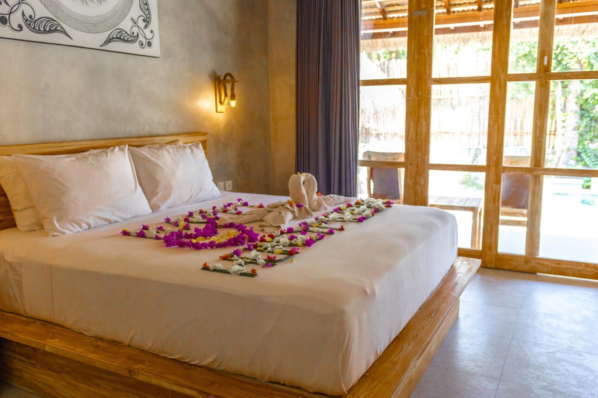 Golden Garuda Cottages Polilit Exterior foto
